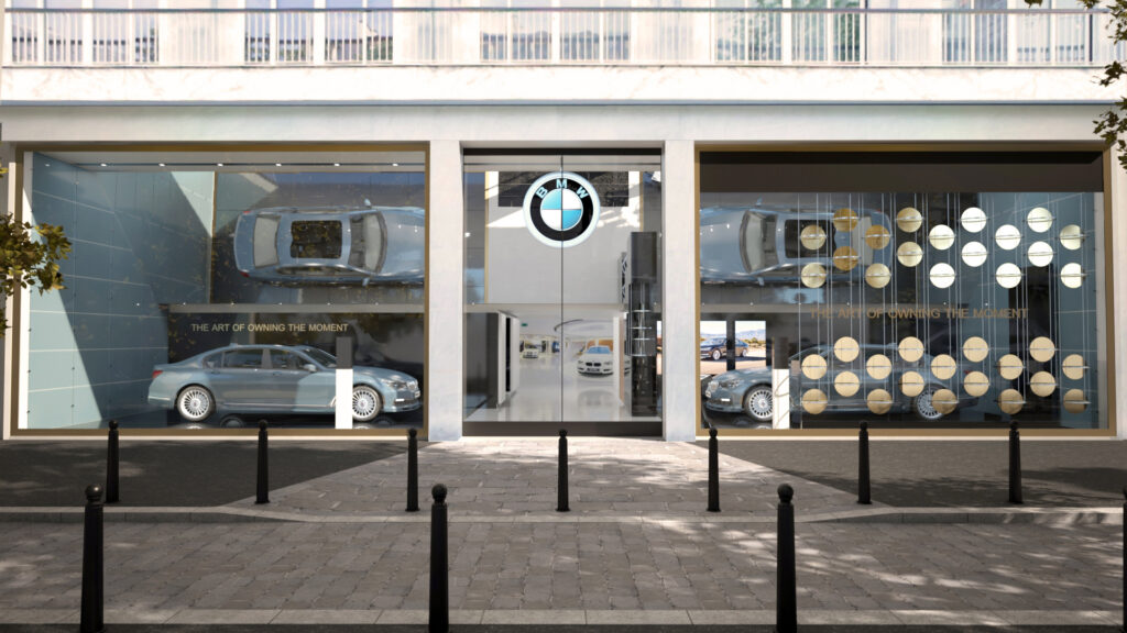 Vue extérieure 3D du Concept Store BMW à Paris, conçue par Redhood Agency. Cette perspective offre un aperçu saisissant de l'architecture moderne et accueillante du concept store, intégrant harmonieusement l'esthétique de BMW à l'environnement parisien.